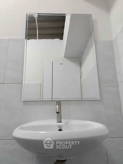 Modern bathroom sink with mirror in minimalist design