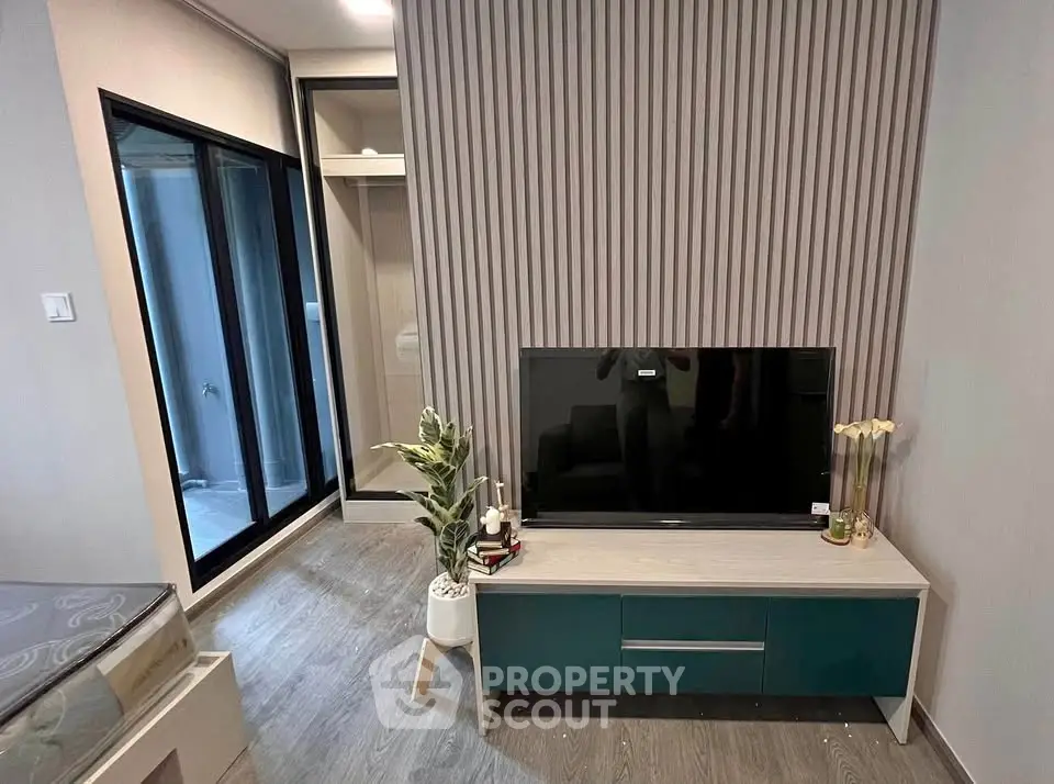 Modern living room with sleek TV stand and stylish decor