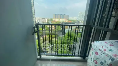 Charming balcony with city view, perfect for relaxation and enjoying urban scenery.