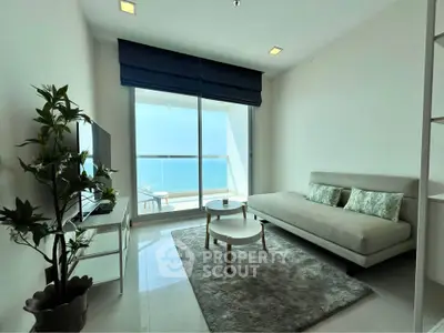 Modern living room with ocean view and sleek furnishings