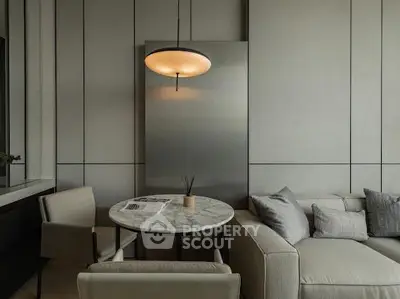 Modern living room with stylish furniture and elegant lighting