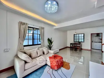 Spacious modern living room with elegant decor and natural light