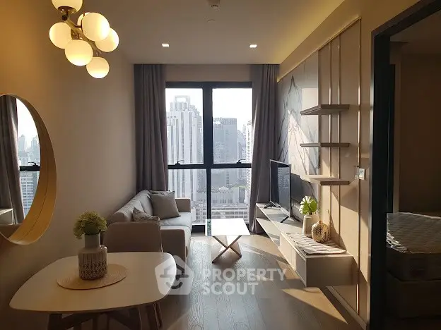 Modern living room with city view, stylish furniture, and natural light.