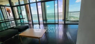 Luxurious high-rise apartment with stunning panoramic views and modern interior design.