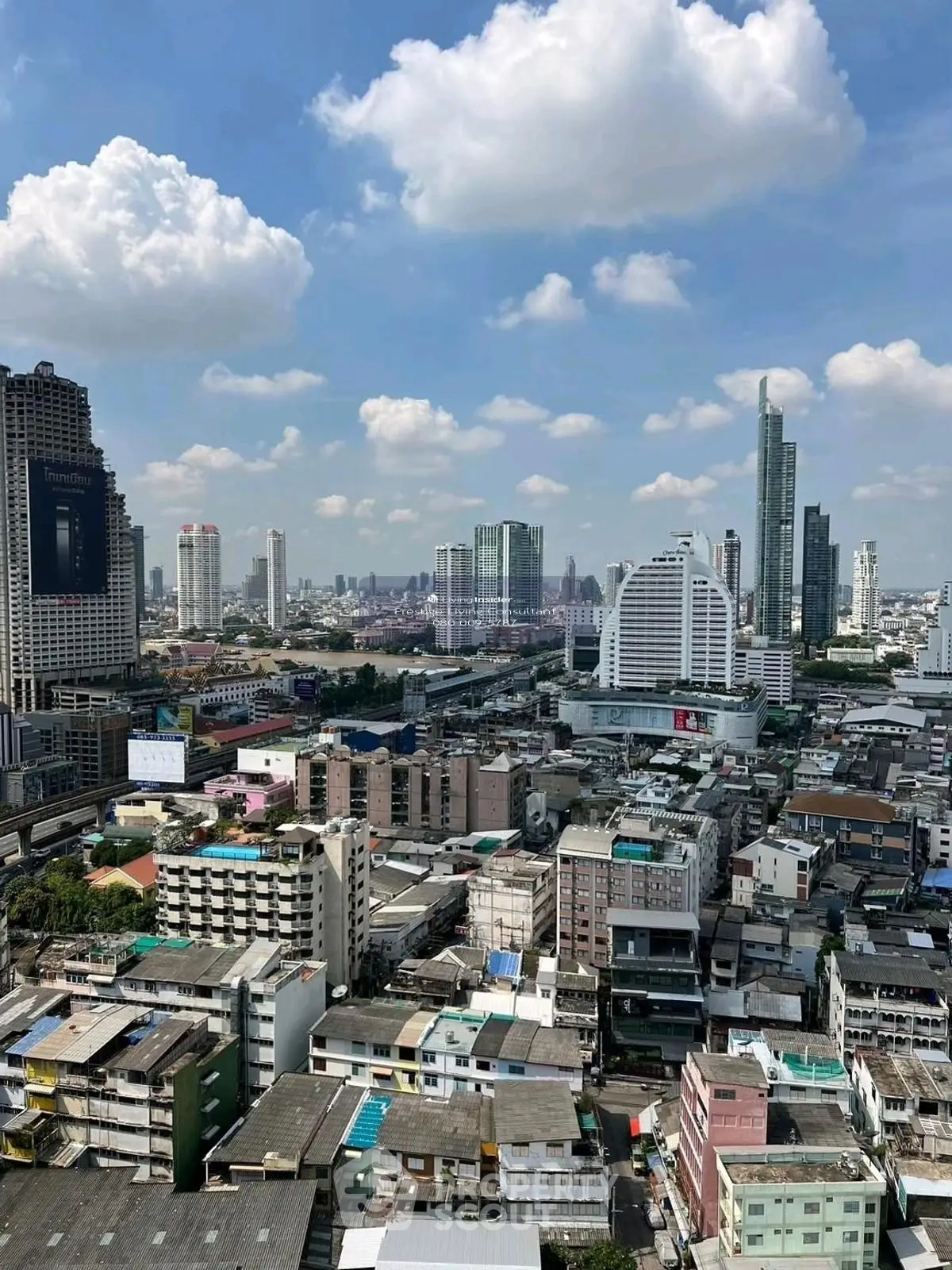 Stunning cityscape view showcasing modern skyscrapers and urban architecture under a clear blue sky.