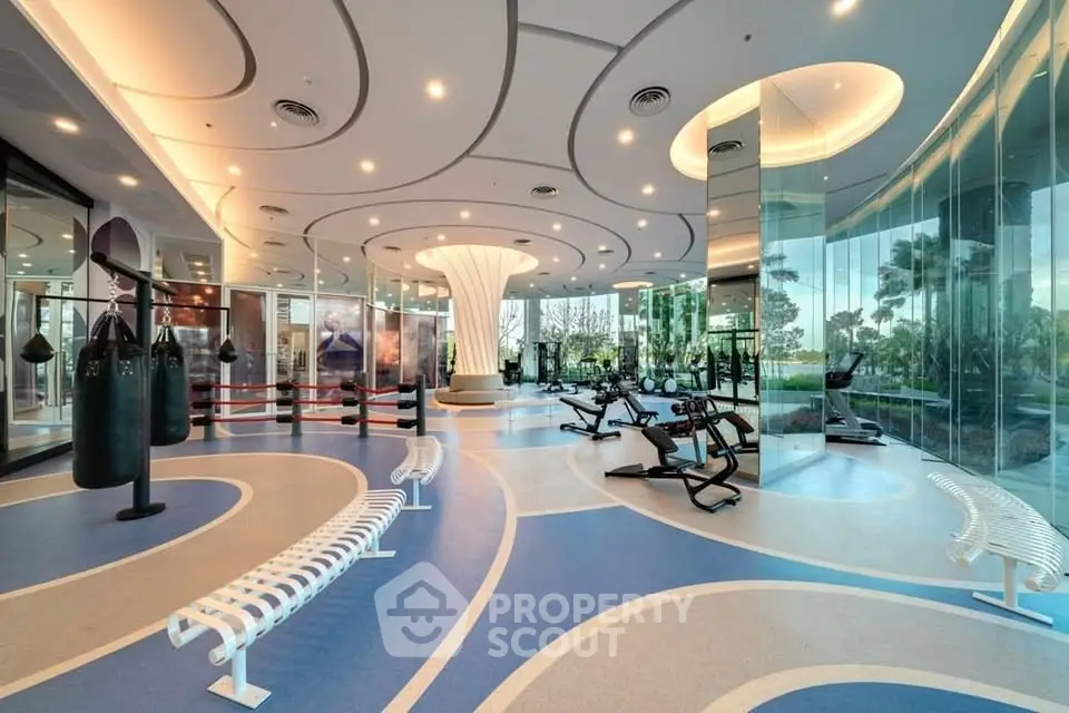 Luxurious modern gym with state-of-the-art equipment and stylish design, perfect for fitness enthusiasts.