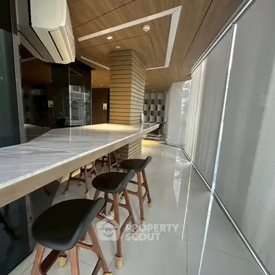 Modern kitchen with sleek design and stylish bar seating