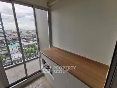 Modern condo balcony with city view and built-in storage