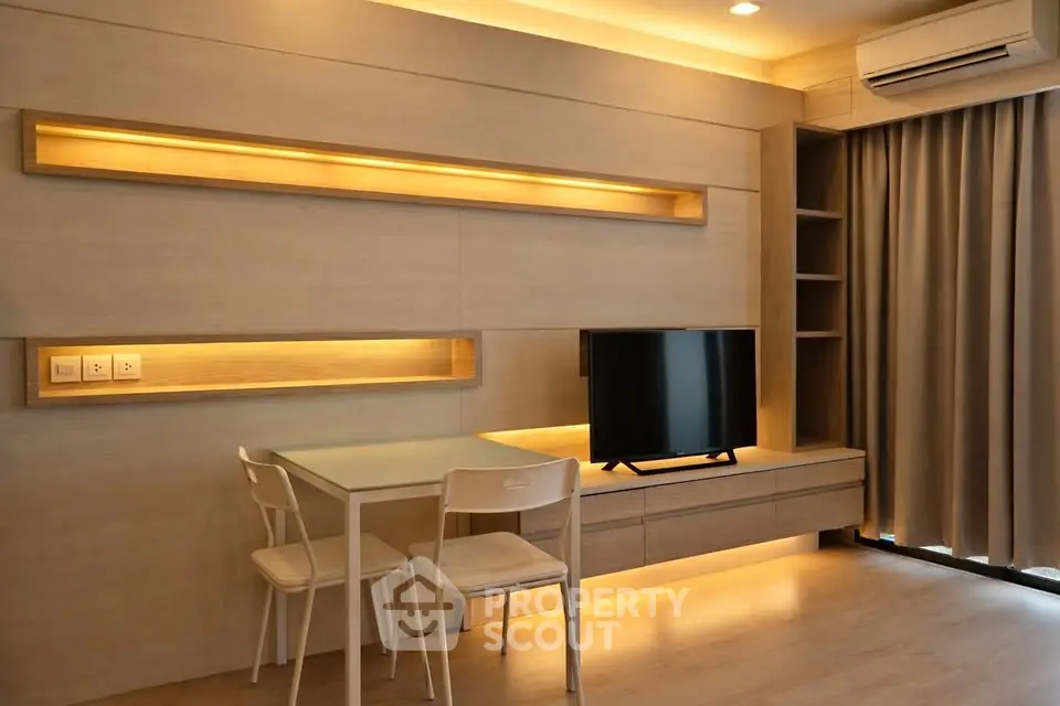 Modern living room with sleek furniture and ambient lighting