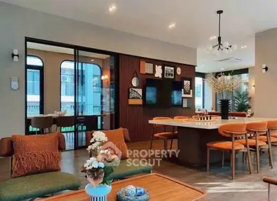 Spacious modern living room with stylish decor and open layout, perfect for entertaining.