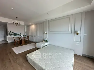 Spacious modern living room with elegant dining area and minimalist decor