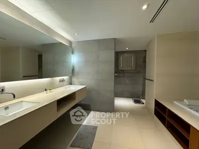 Luxurious modern bathroom with dual sinks and elegant design