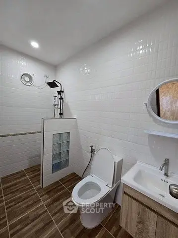 Modern bathroom with sleek fixtures and stylish tile flooring