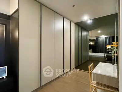 Elegant bedroom with spacious wardrobe and stylish vanity area