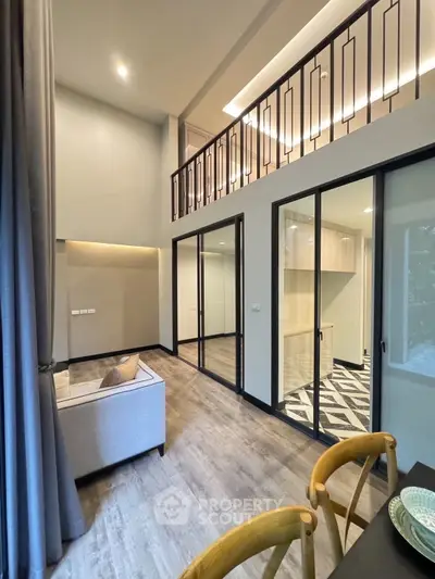 Modern duplex living room with high ceilings and stylish interior design