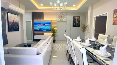 Luxurious modern living room with elegant dining area and stylish decor