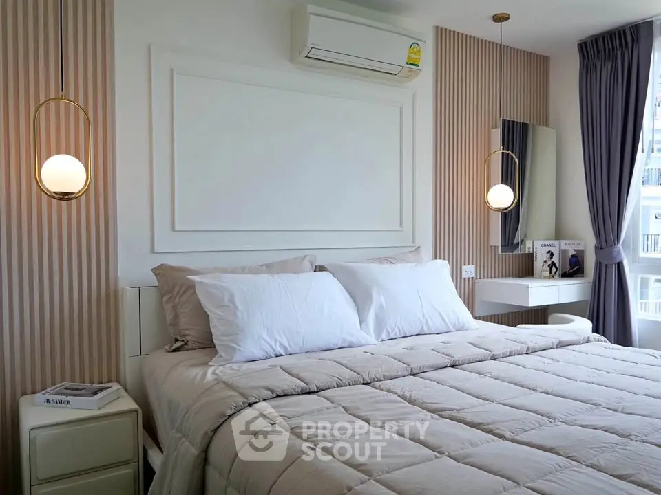 Luxurious bedroom with modern decor and elegant lighting, featuring a cozy bed and stylish wall accents.