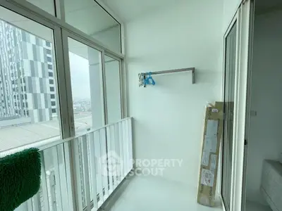 Modern balcony with city view and sleek glass railing