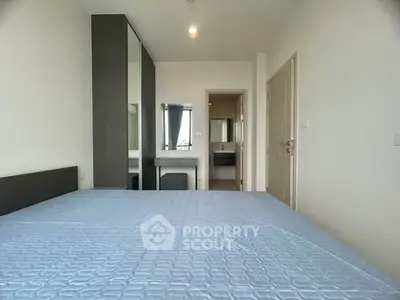 Modern bedroom with ensuite bathroom and sleek design