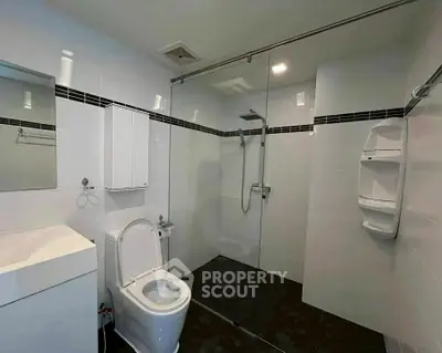Modern bathroom with sleek shower and contemporary fixtures