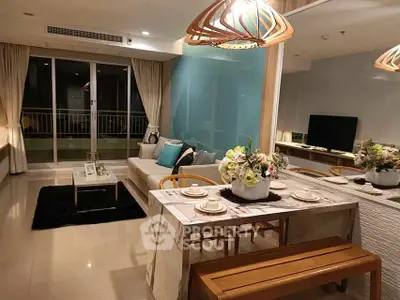Luxurious open-plan living room with elegant dining area and balcony view