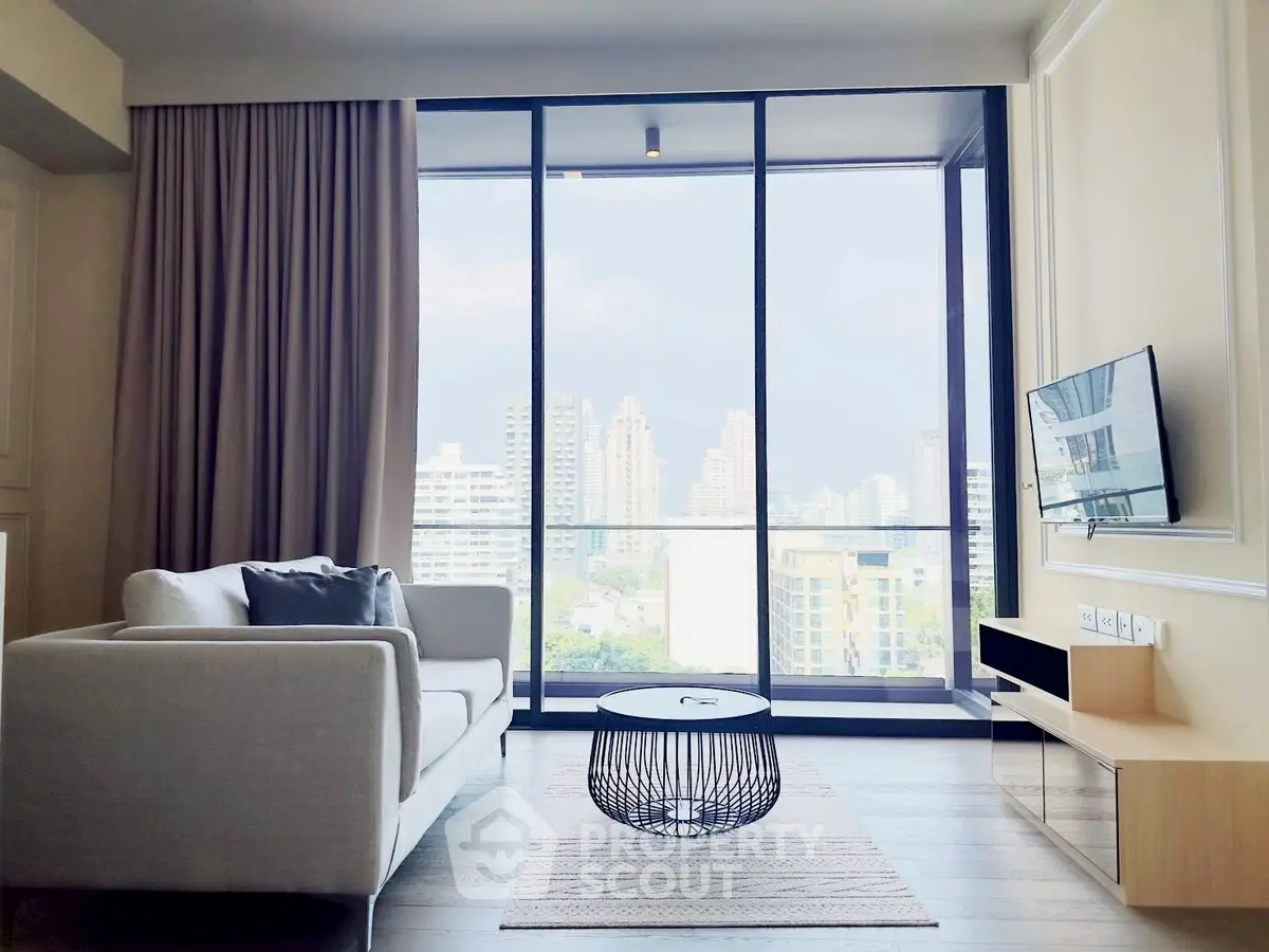 Modern living room with panoramic city view and stylish furniture