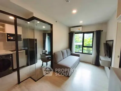 Modern living room with glass partition and natural light in stylish apartment