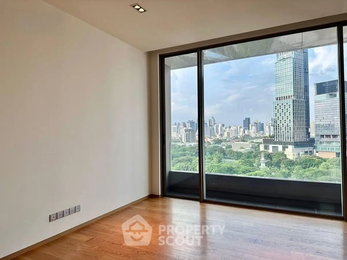 Spacious corner unit with stunning city view and hardwood floors