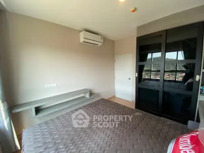 Modern bedroom with air conditioning and scenic window view