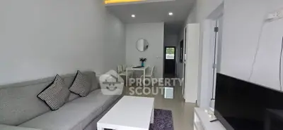 Modern living room with sleek furniture and minimalist decor