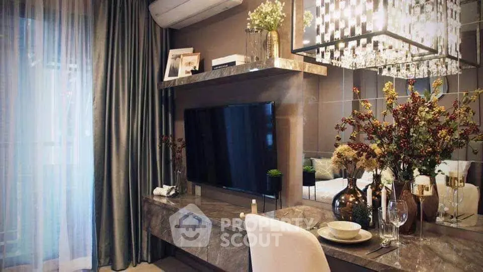 Luxurious living room with elegant decor and modern chandelier