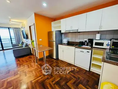 Modern kitchen with open layout and stylish living room view