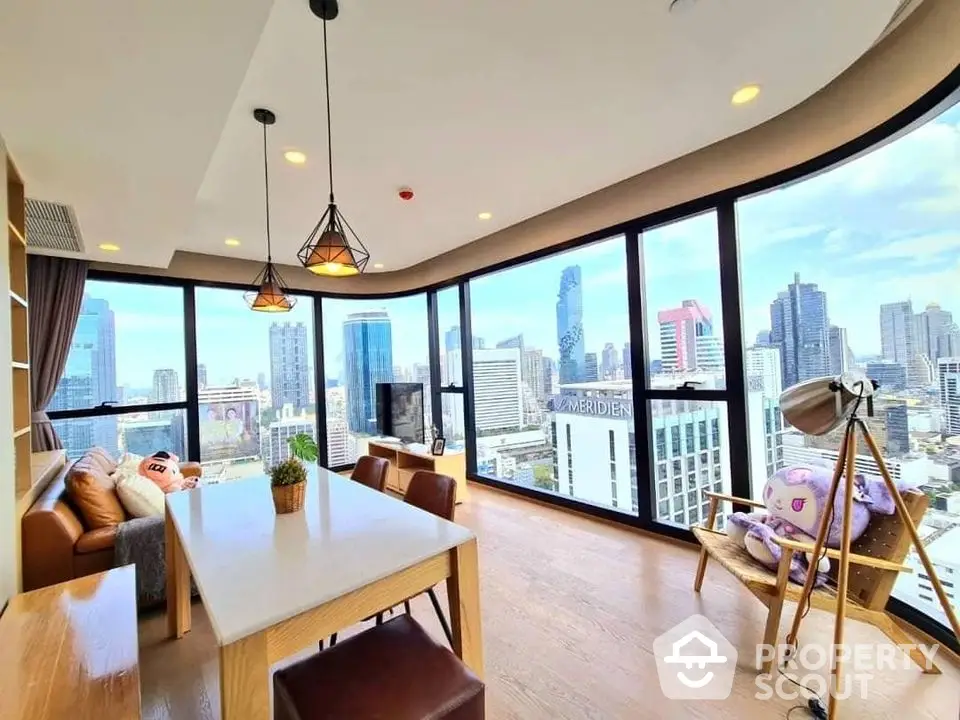 Stunning corner unit with panoramic city views and modern interior design