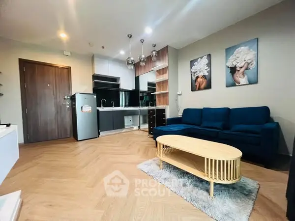 Modern living room with stylish decor and open kitchen layout