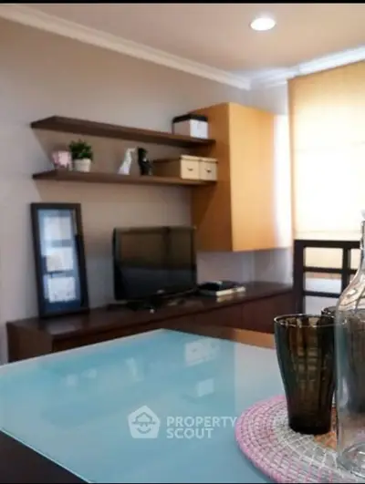 Modern living room with stylish shelves and TV setup