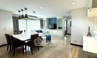 Spacious modern living room with dining area and natural light