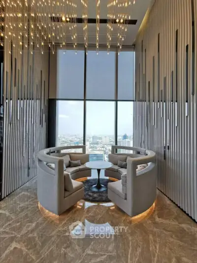 Luxurious high-rise building interior with panoramic city view and elegant seating area.