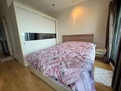 Cozy bedroom with modern design and ample natural light