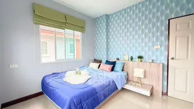 Cozy bedroom with modern decor and natural light