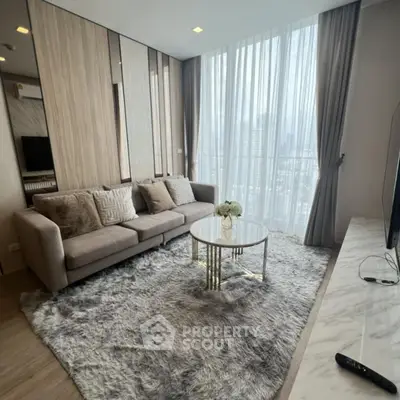 Luxurious modern living room with plush sofa and city view