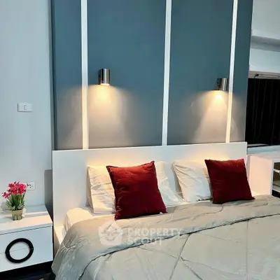 Modern bedroom with stylish lighting and elegant decor