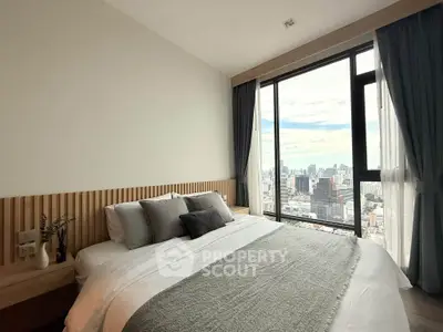 Luxurious bedroom with stunning city view and modern decor