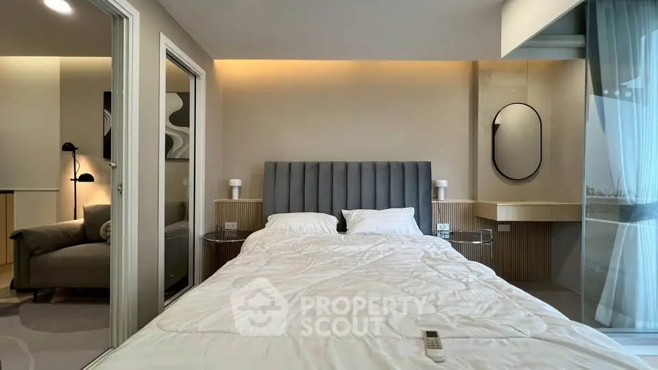 Luxurious modern bedroom with plush bed and stylish decor