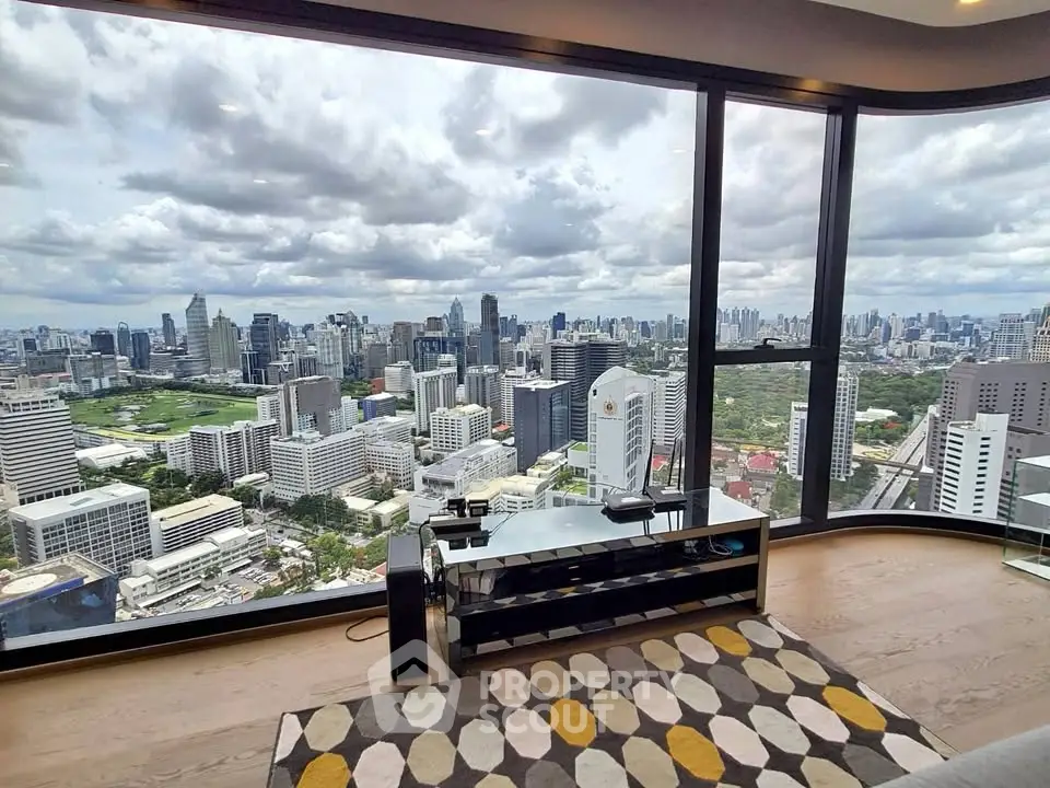 Stunning high-rise apartment with panoramic city views and modern interior design.
