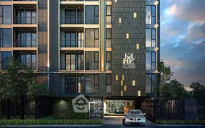 Modern luxury apartment building exterior with sleek design and stylish facade, featuring a parked car in front.