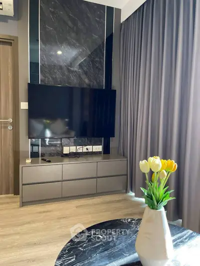 Modern living room with sleek TV setup and elegant decor