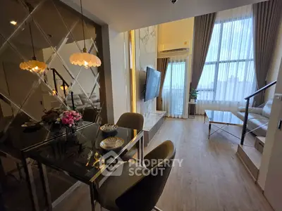 Modern living room with elegant dining area and large windows