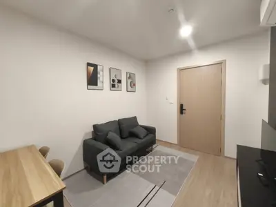 Modern living room with minimalist decor and cozy sofa