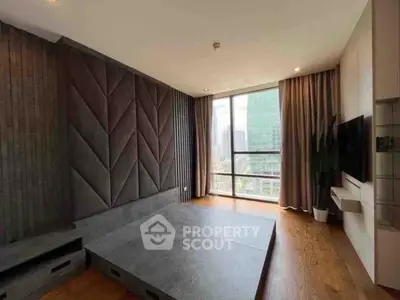 Modern living room with large window and stylish wall design in urban apartment