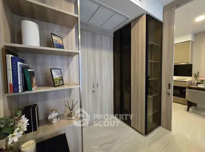 Modern interior with stylish shelving and elegant decor in a cozy living space.